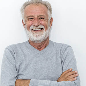 a man smiling at lovett dental missouri city services