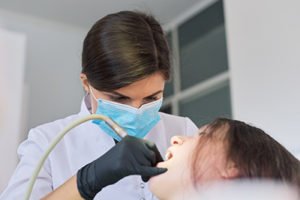 a Houston Sedation Dentist helping a patient overcome their fear