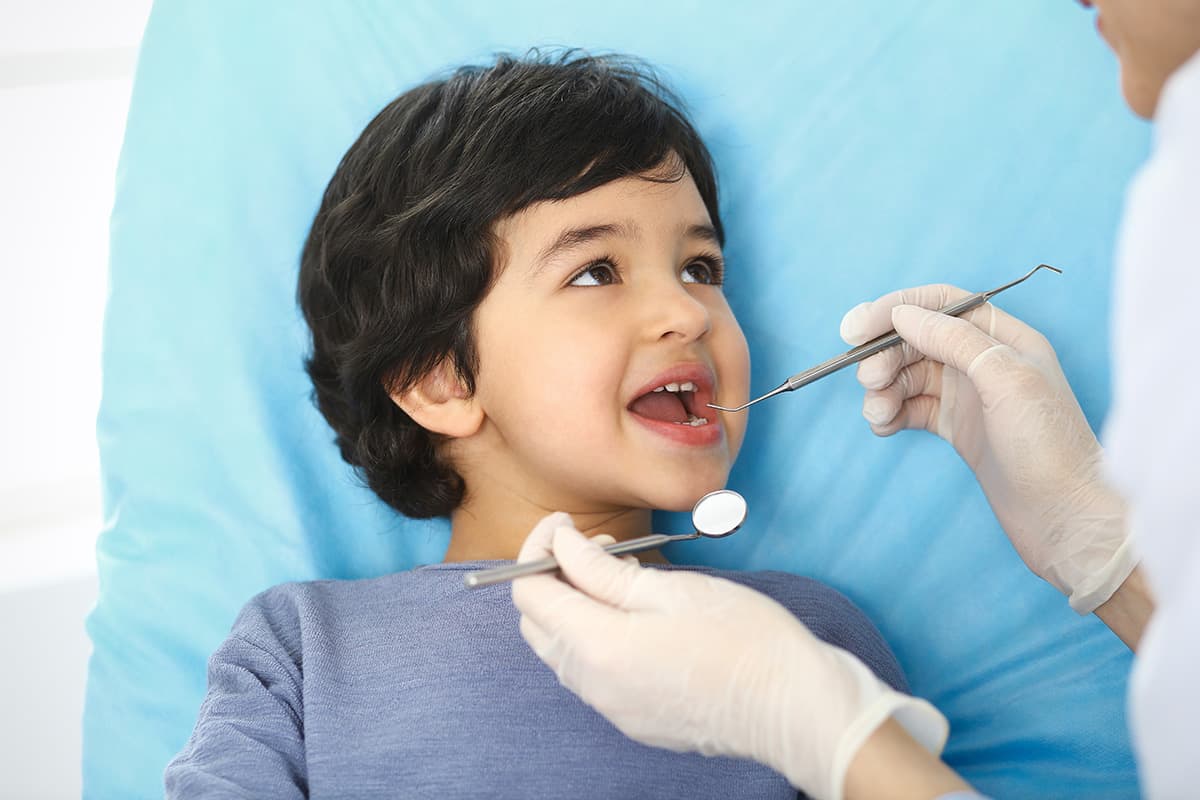 childrens dentistry,pedatric dentistry kid getting childrens dentistry