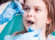child gets a dental check up