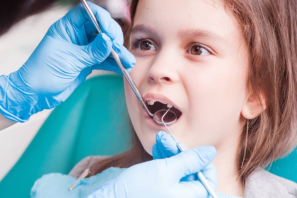checkup, dental check up child gets a dental check up
